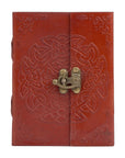 Red leather journal with an embossed endless knot design and a brass metal closure, shown closed on a light background.