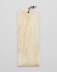 Cream colored wooden cutting or serving board displayed on a white background