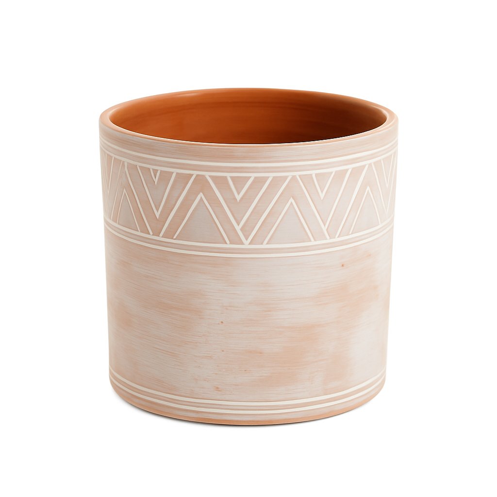 Ceramic planter with geometric pattern on a white background