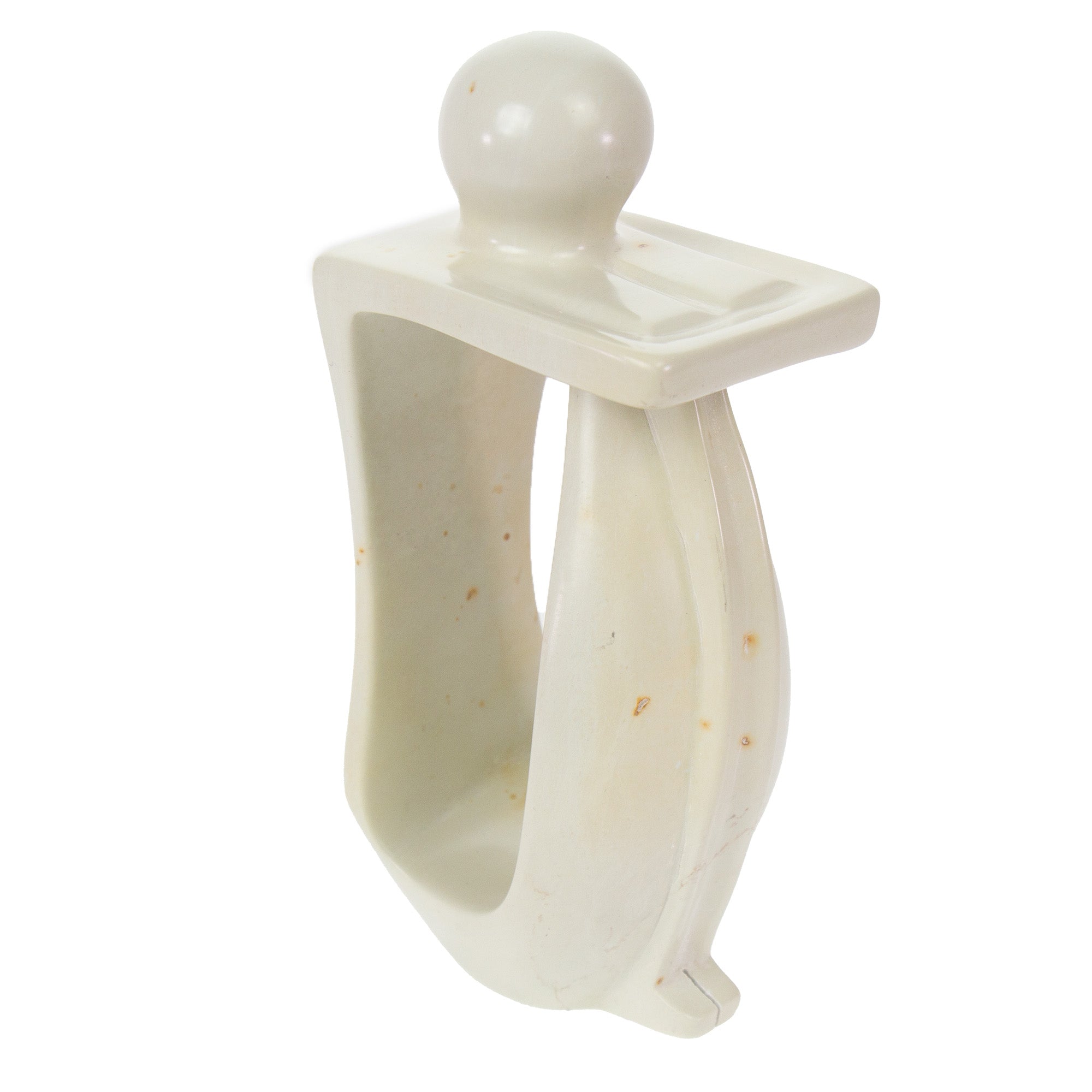 Hand-carved soapstone sculpture of a person in a thoughtful pose with a bookend feature on one side