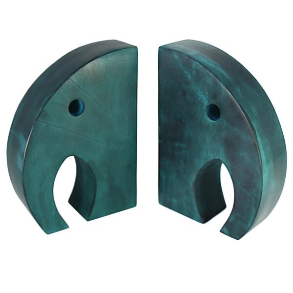 A pair of teal colored elephant bookends made from soapstone, with a smooth and shiny finish