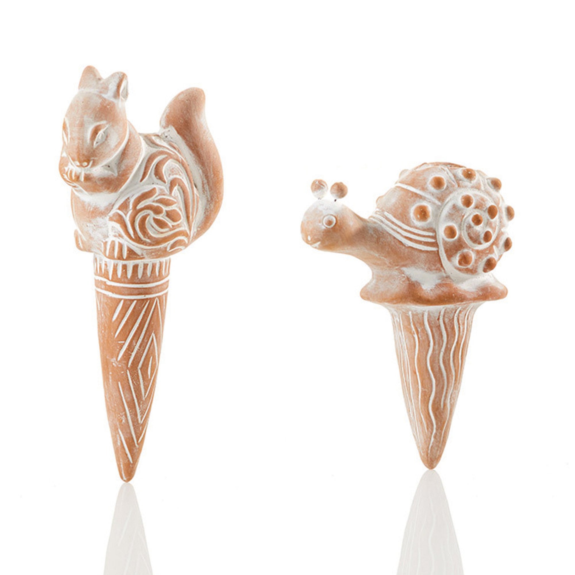 Two terracotta stakes with one designed as a snail and the other as a squirrel, set against a white background