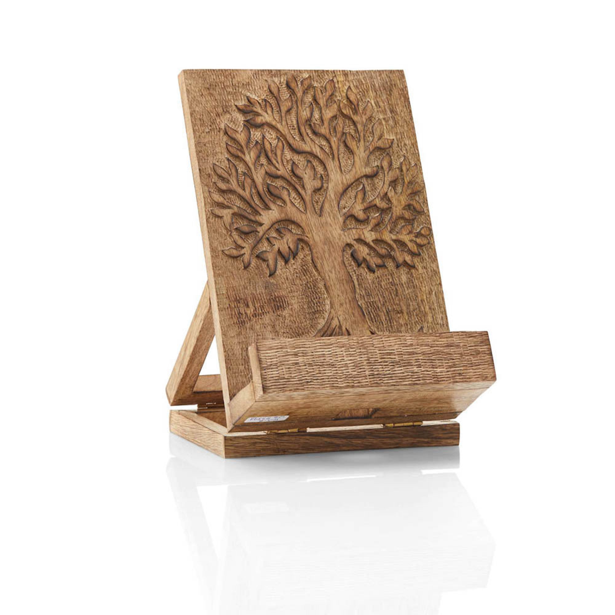 Handcarved wooden recipe stand with a leafy tree design, etched into the front surface, with an adjustable back stand and a charger port opening