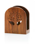 A wooden napkin holder with a Tree of Life design, made from shesham wood, with a curved front and a flat back