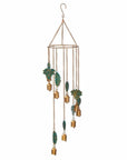 A gold-colored wind chime with recycled iron leaves and bells, designed for indoor or outdoor use