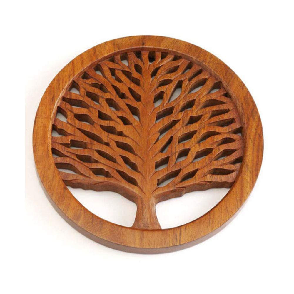 A round wooden trivet with a tree of life design in the center, crafted from sheesham wood