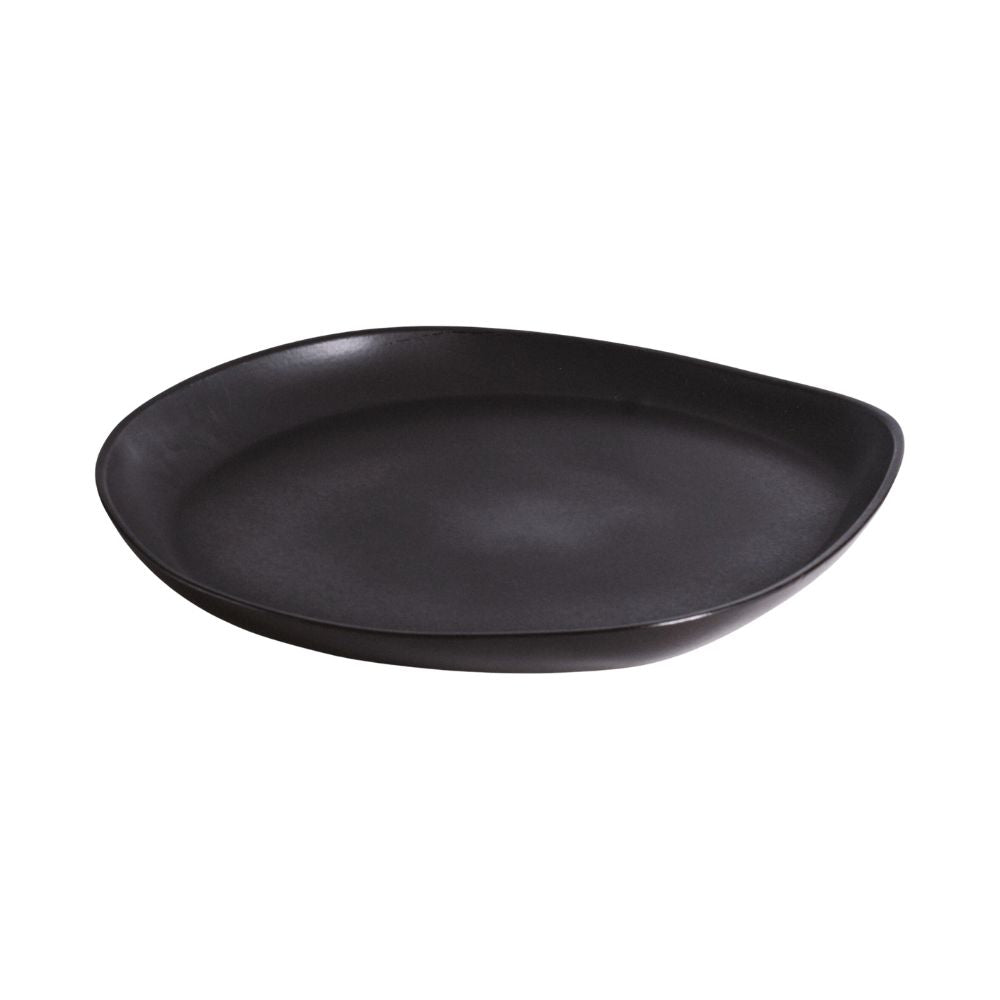 A round, black stoneware serving platter with a simple and elegant design, hand-crafted with visible edges and a smooth surface