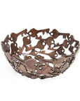 A handcrafted decorative bowl made of assorted recycled iron keys with a copper-colored finish.
