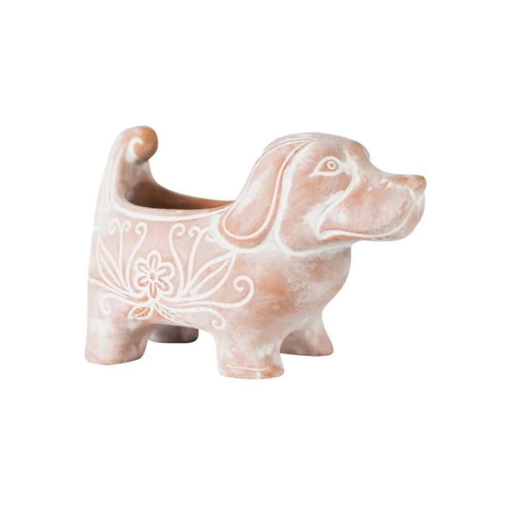 A handcrafted terracotta dog planter with a whitewashed finish, featuring decorative patterns
