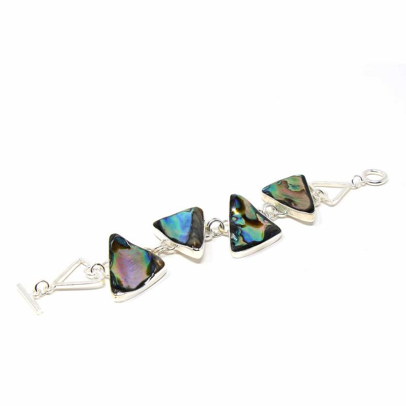 A link bracelet with silver-plated triangles and abalone inlays, featuring a hook and link closure.