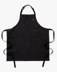 Black apron with a red label on a white background