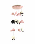 A pink and black hand-felted mobile with sheep and clouds, designed for baby cribs.