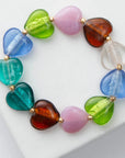 Multicolored glass beaded bracelet on a white surface