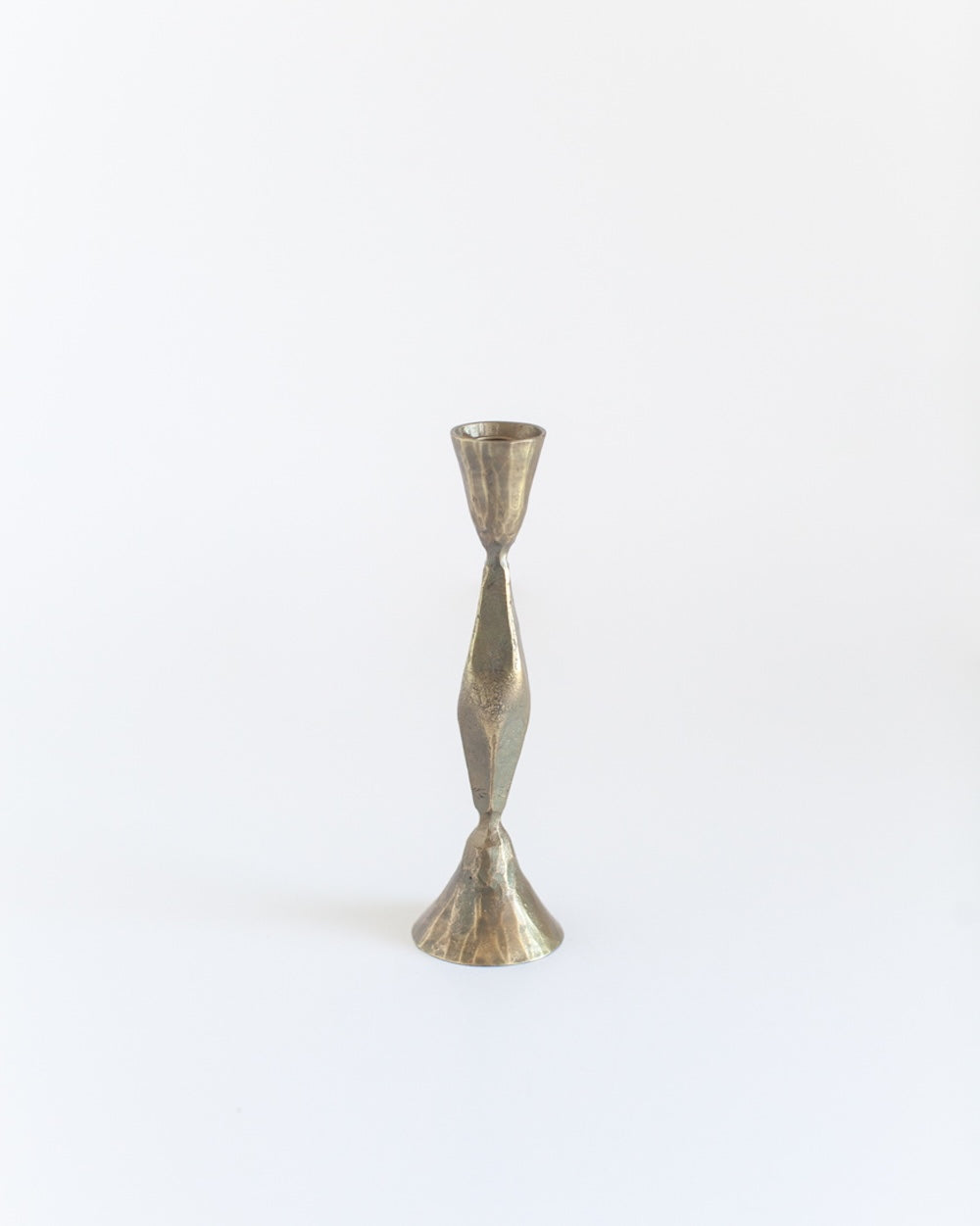 Metallic candle holder on a white background