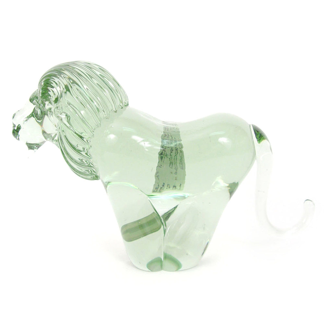 Side view of a clear glass lion sculpture made from recycled glass, with a smooth and polished finish.