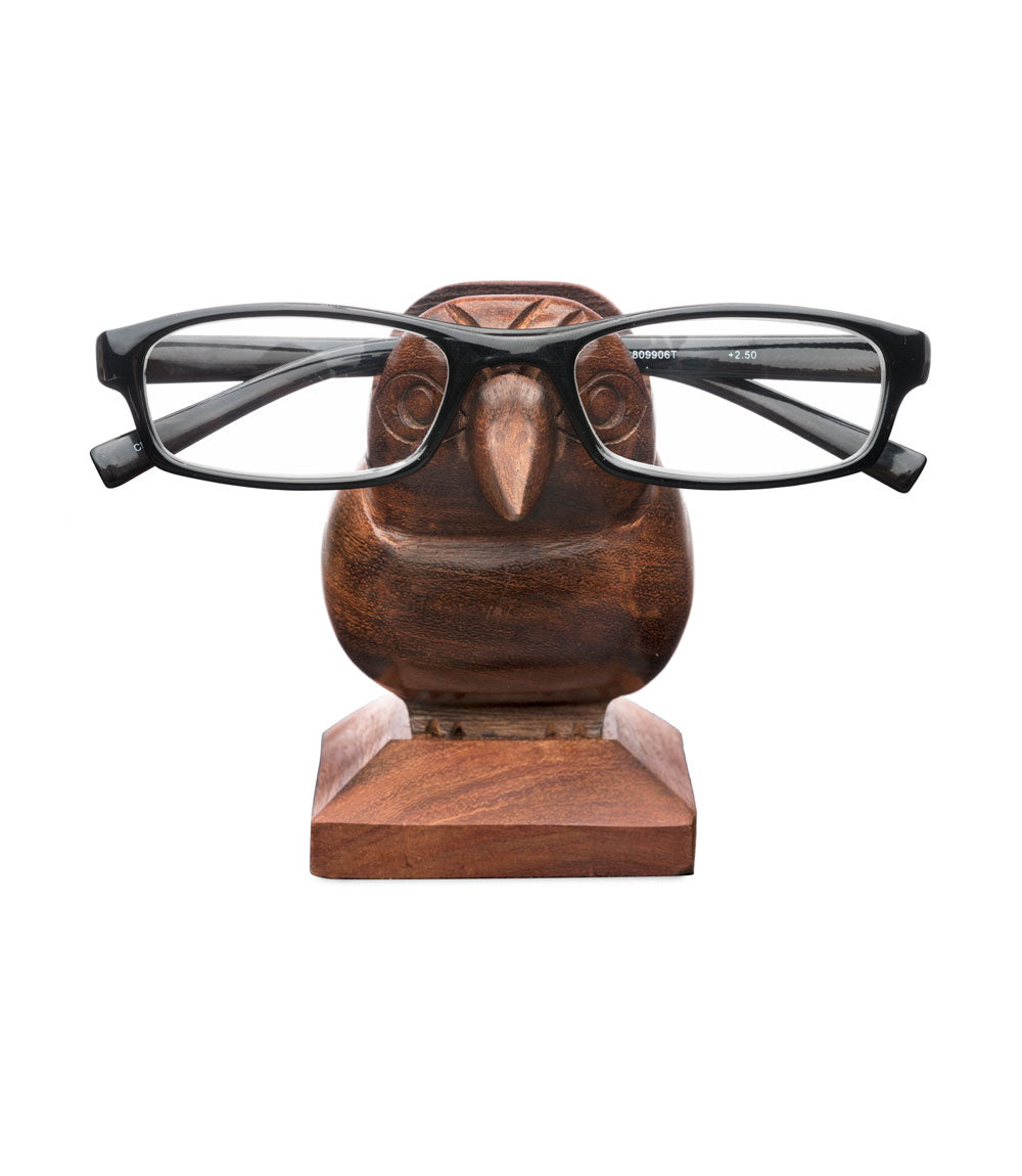 A handcrafted Indian rosewood eyeglass stand shaped like a house sparrow perched on a base.
