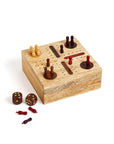 A hand-carved wooden Pachisi game set with a hinged lid, game peg pieces, and dice.