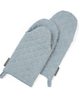 A pair of blue oven mitts made from upcycled cotton, displayed against a white background