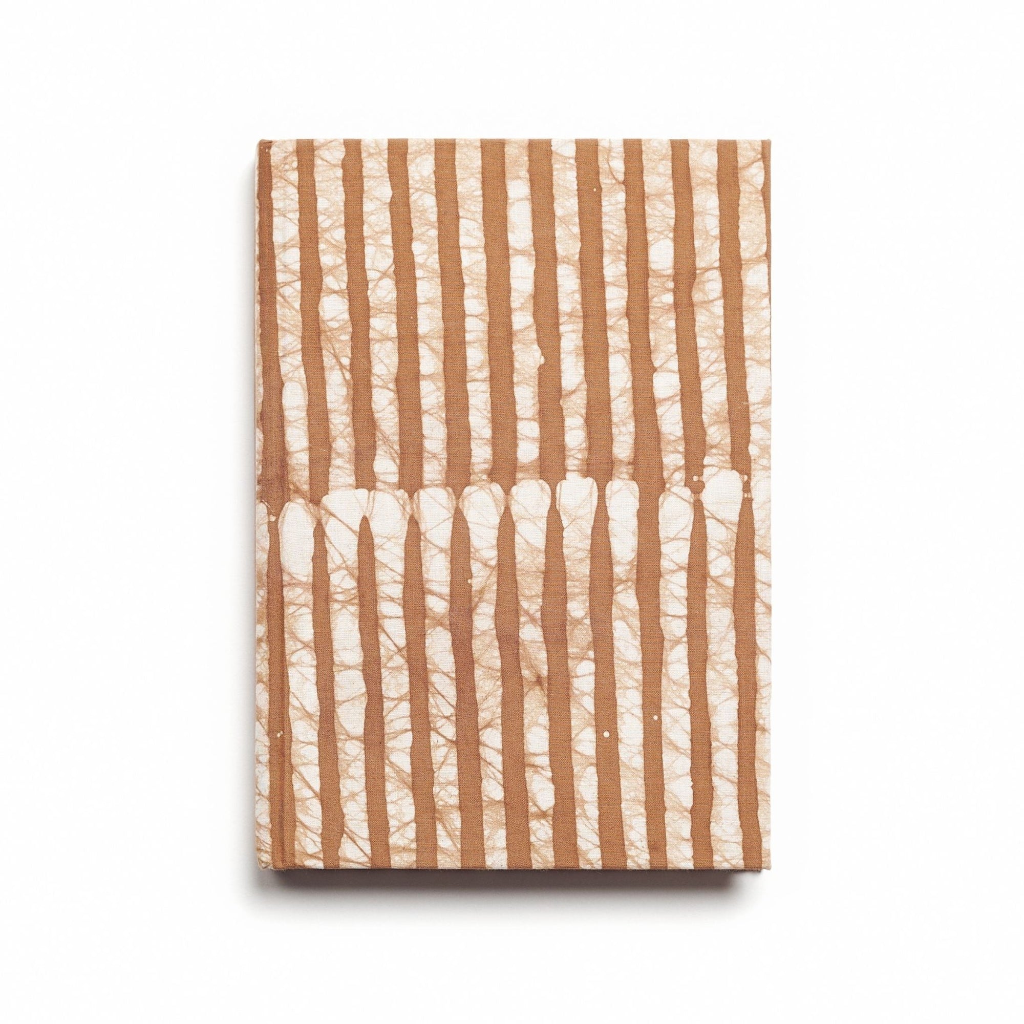 Notebook with brown and white striped pattern on a white background
