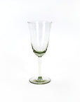 A clear hand blown recycled wine glass