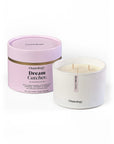 Osmology Dream Catcher candle with pink packaging on a white background