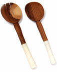 A pair of olive wood salad servers with white bone handles featuring etching design details