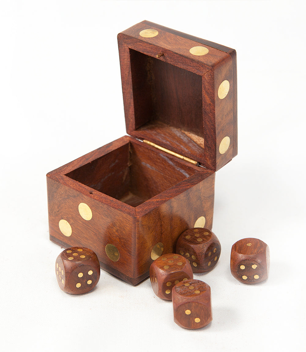 Wooden dice box with gold accents and five wooden dice on a white background