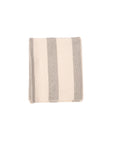 A folded striped tea towel with beige and gray colors, likely made from cotton, on a white background