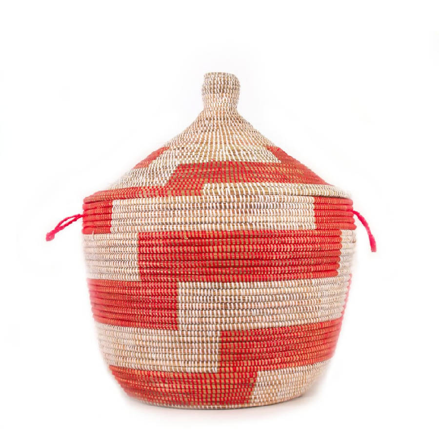 A large, round, red and beige striped storage basket with a lid, made from recycled materials.