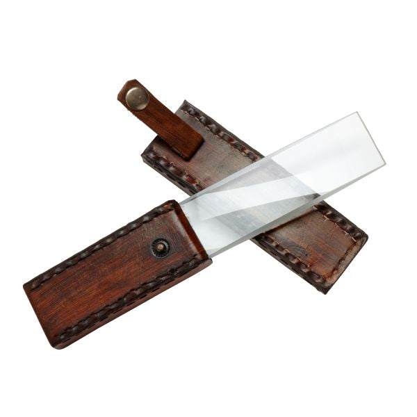 Magnifying glass with leather handle on a white background