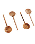 A set of four hand-carved olive wood coffee spoons, each with a unique grain pattern, displayed on a white background
