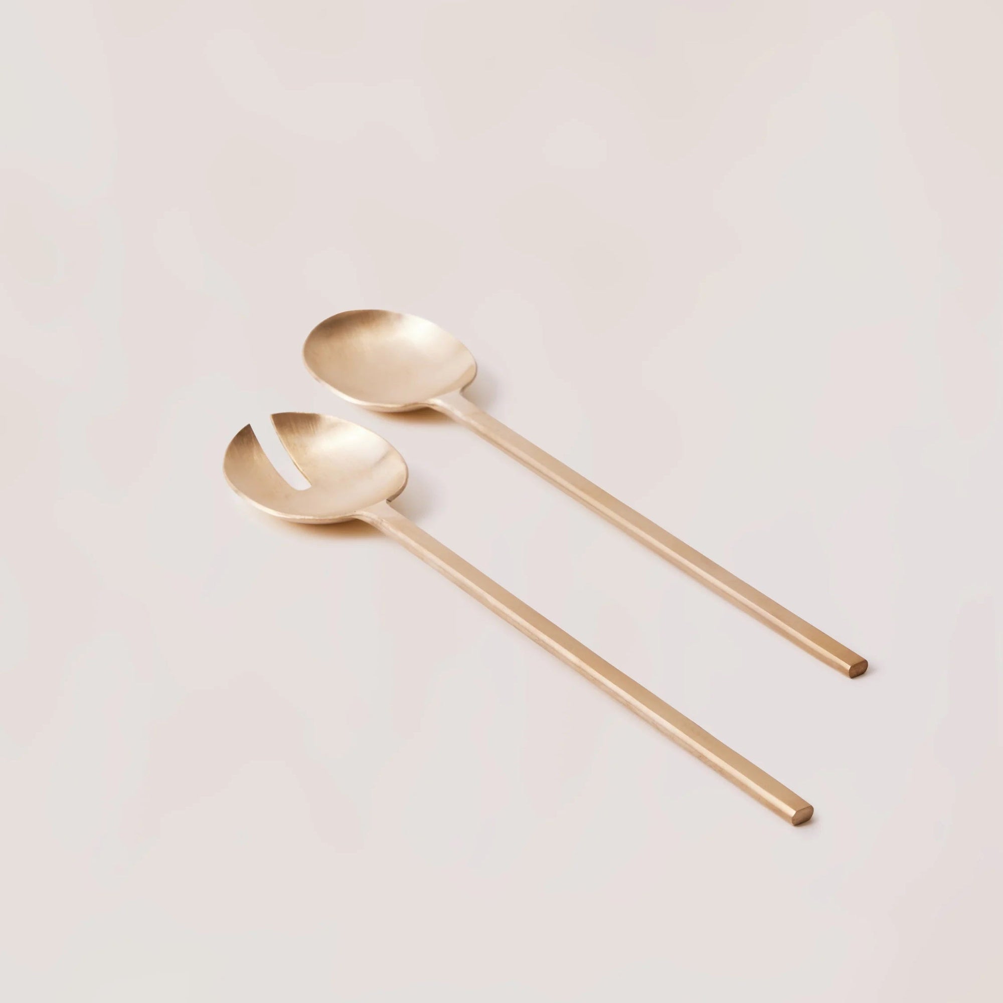 Gold metal loop salad servers - serving utensil collection at Better World Bio