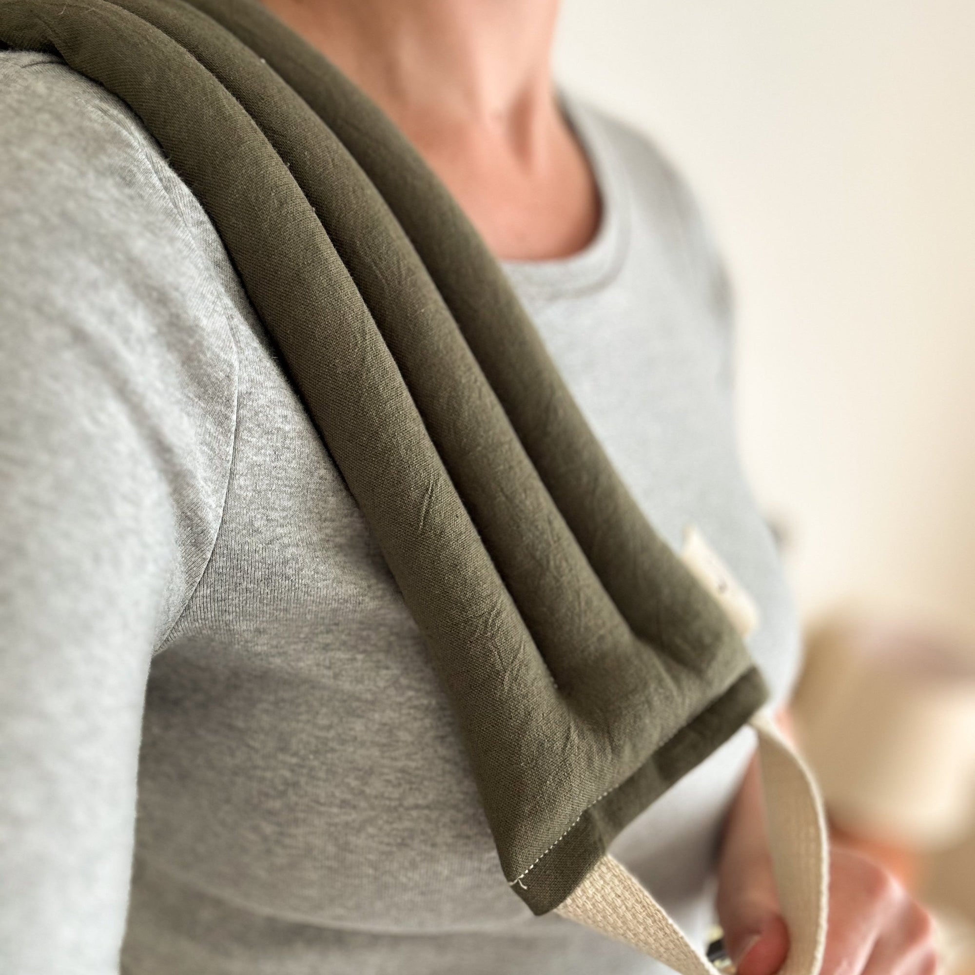 Neck wrap laying arranged on a person's shoulder — Self-Care & Wellness Accessories Collection at Better World Bio