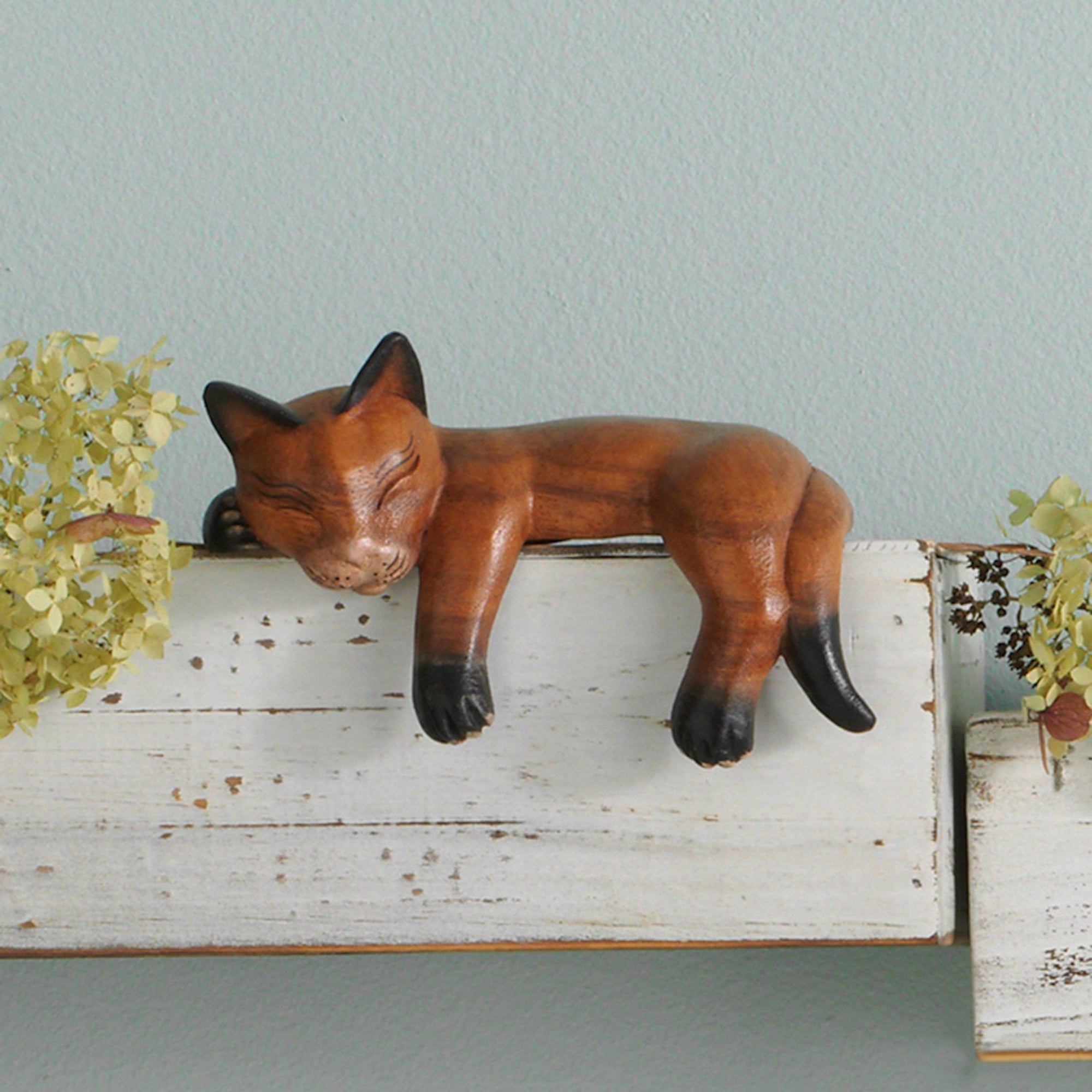 Handcarved cat shelf sitter on a shelf - Sculptures at Better World Bio