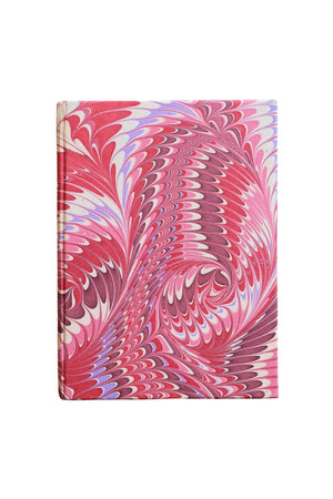 Notebook with pink and white marbled cover on a white background