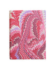 Notebook with pink and white marbled cover on a white background