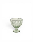 Clear parfait glass goblet on a white background
