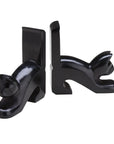 Black cat-shaped bookends on a white background