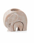Ceramic elephant-shaped planters on a white background