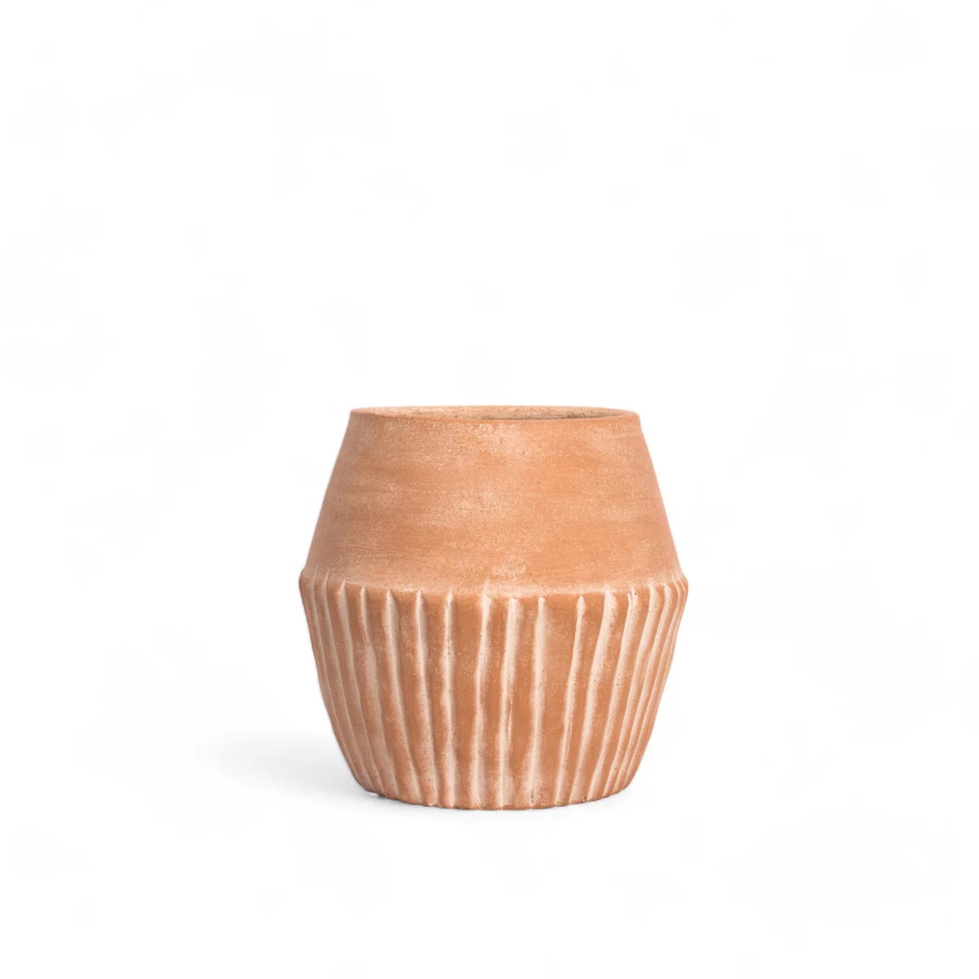 Terracotta pot with ribbed texture on a white background