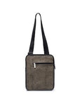 Brown crossbody bag with a strap on a white background
