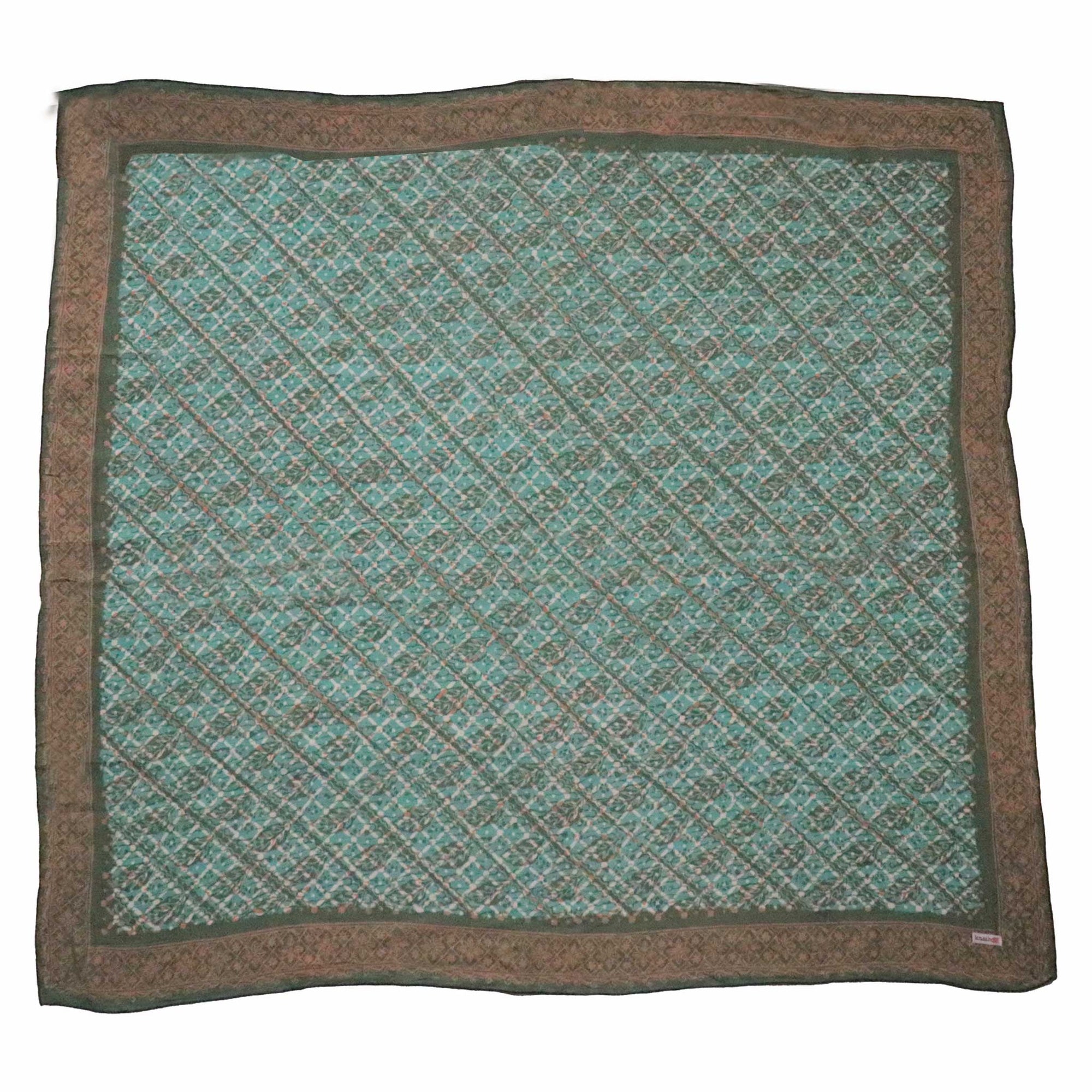 Teal and brown patterned fabric square  bandana on a white background
