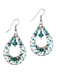 Teal beaded earrings on a white background