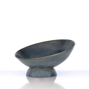 Blue ceramic bowl on a white background