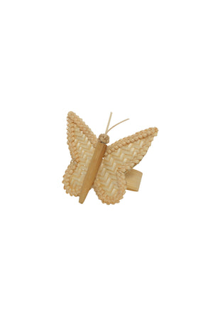 Butterfly-shaped napkin holder with woven design on a white background