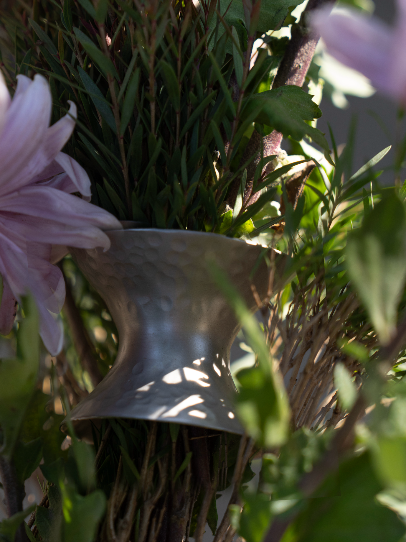 Decorative leaves with pink flowers and green leaves on a white background