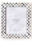 Handcrafted gray and white picture frame with a geometric pattern, brand name Matr Boomie visible on the frame