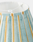 Striped fabric with green and yellow lines on a white background