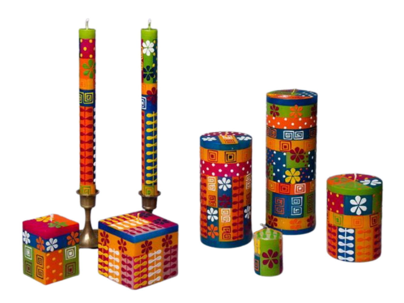 Colorful candle holders and boxes with geometric patterns on a white background