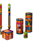 Colorful candle holders and boxes with geometric patterns on a white background